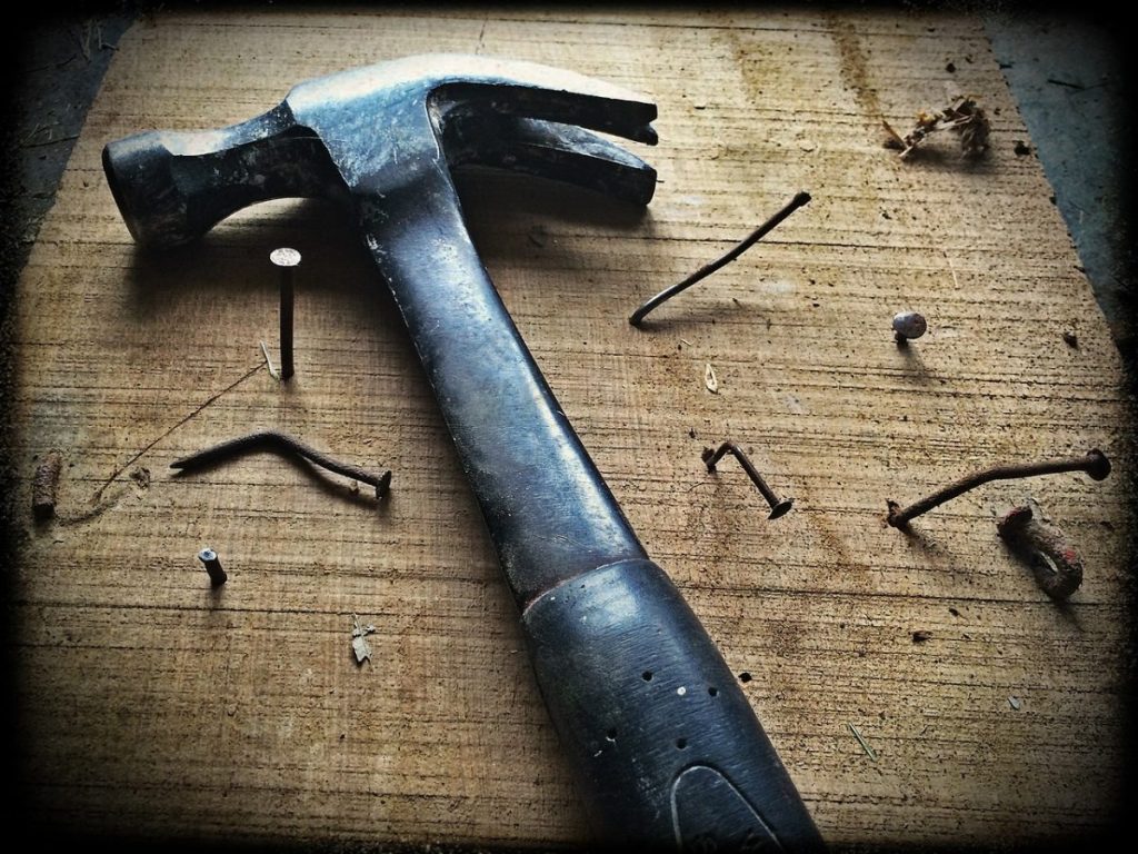 photo of nails and hammer