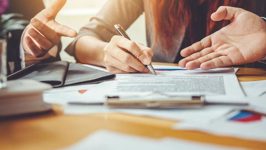 signing-loan-paper