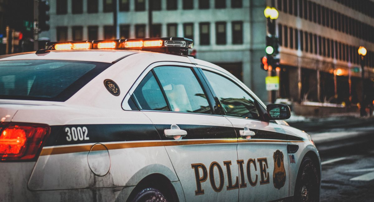 police car at street light