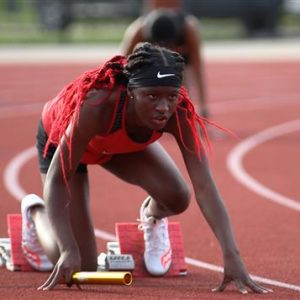 Clinton High School Girls Track and Field Runner At the Starting Block