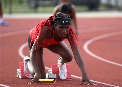 Clinton High School Girls Track and Field Runner At the Starting Block