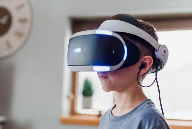 boy wearing virtual realty glasses