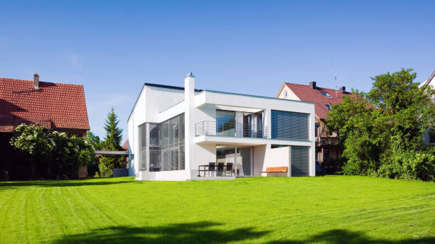 modern-architecture-home-green-on-green-summer-meadow