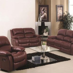 3 brown leather sofas in living area