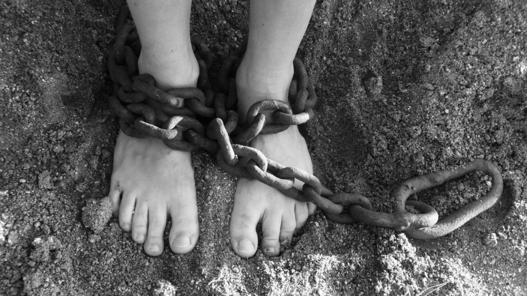 feet wrapped in chains