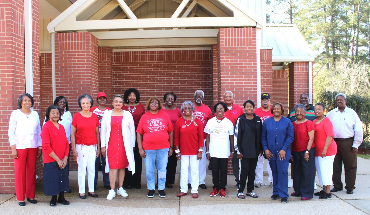 Pictured (l to r) are graduates of the original Sumner Hill High School, front row: Alice K. Brown, Shirley Burns, Sarah K. Beechem, Lula Tripp, Lucy G. Course, Shirley Miller, Marilyn Jean Minton, Yvonne Toaster, Elmira Williams, Earlean Tillman and Alice C. Jackson; and back row: Clotie Graves, Elease A. Kelly, Betty G. Spencer, Priscilla W. Edwards, John Hodge, Archie Hodge, George Martin, Jermaine Brown and James Hawkins. The group is preparing for their reunion, set for June 30 through July 2.