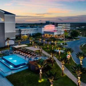 On the far left, the Gulf of Mexico and sandy beach serve as a boundary line for the Silver Slipper Casino Hotel located in a cul-de-sac at the end of Beach Boulevard, making a visit seem like a trip to a private island.