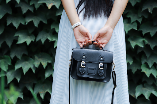 Woman holding purse 