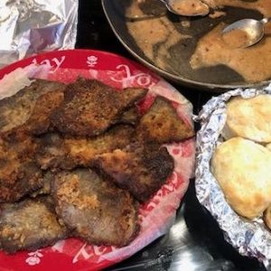 Made regularly by Ladye’s mom, Yvonne’s famous breakfast steaks with sides of gravy and biscuits are a favorite family recipe.