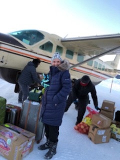 Warm clothes are necessary, but space was limited as Dixie Ishee packed for her work in Alaska. Flying into northwestern Alaska is a tough day-and-a-half journey. She had an overnight stay in Anchorage before completing the trip to her station on a small plane carrying supplies. A full day's work awaited her.