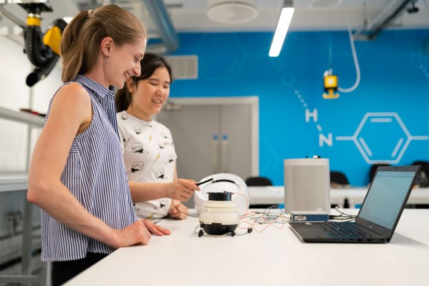 a group of young females testing in a lab