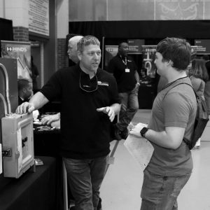 Clinton High School senior Gavin Byrd (right) says he is considering living on campus at Hinds Community College. Byrd is pictured speaking with Hinds Electrical Technology Instructor Craig Davis.