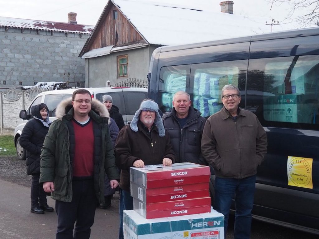 Heaters and generators are shared with a Ukraine pastor and his family for their church by (l to r) Pastor Oleg Gricyk, Bob Gilmore, Pastor Nikolai Sukhyna and Russell Kyzar.