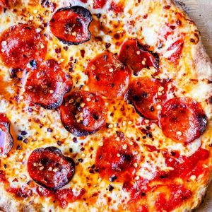 Homemade pepperoni pizza can be prepared and baked in minutes.