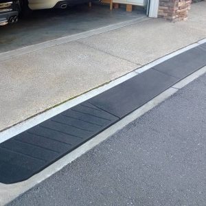 black driveway ramp