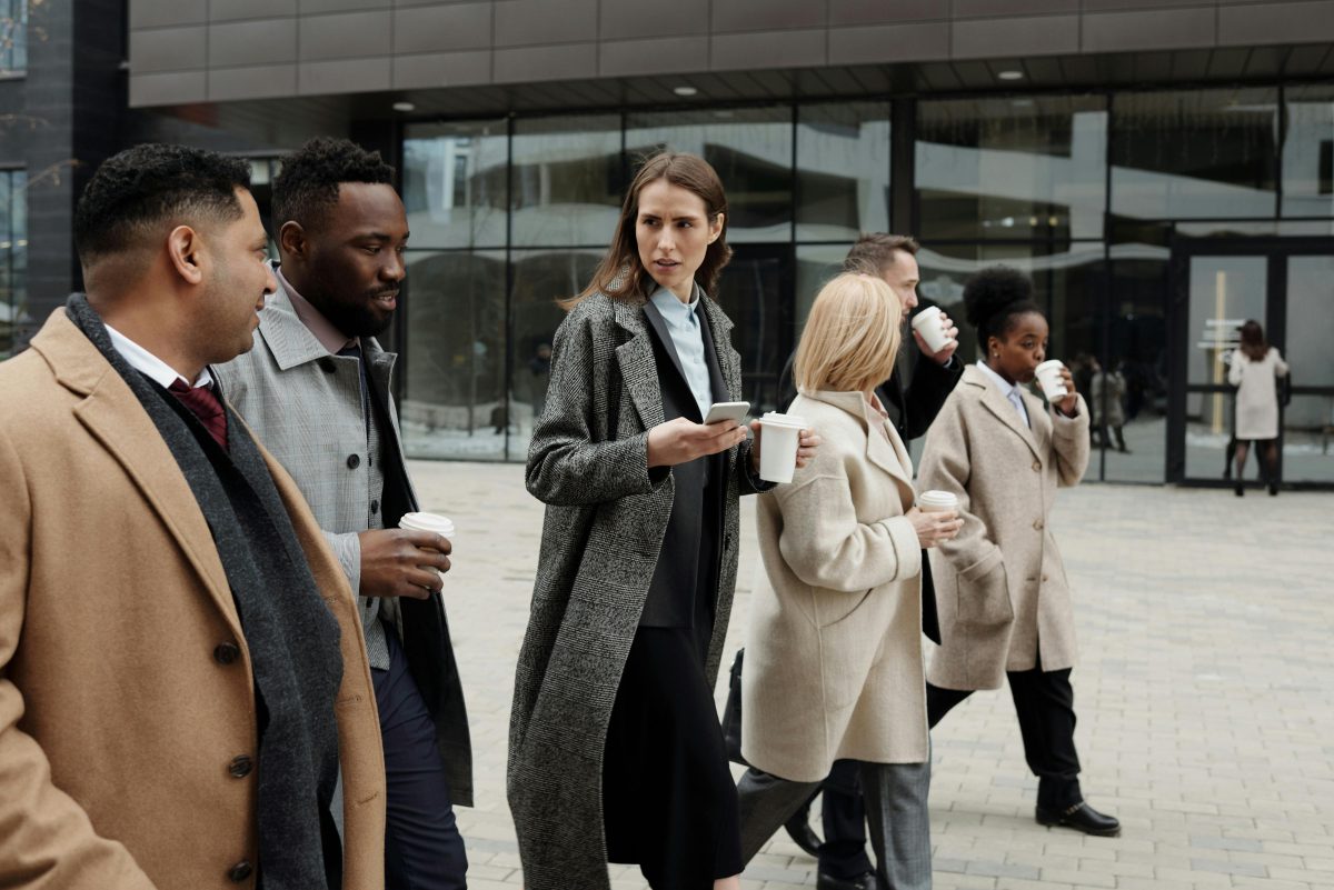 Business people taking a coffee break and talking