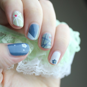 blue with design manicured nails