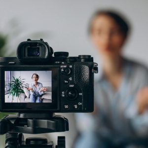 young woman blogger video blogging