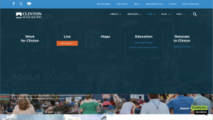 Find the “LIVE” dropdown menu, and hover over it; then, click the “Work for Clinton” Link on the far left.