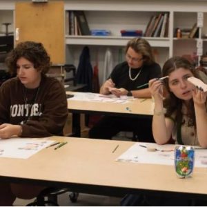 Art education majors glazing ornaments to be fired in the kiln at the Gore Arts Complex include, from left, Hannah Shows, a freshman from Long Beach; JT McNamee, a senior from Clinton, and Catherine Williams, a freshman from Memphis, Tennessee.
