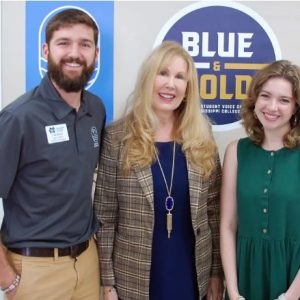 Dr. Beth Baker-Janser, center, visits with Mississippi College Department of Communication students Cole Benoit, agency director of Big River Strategies, and Emma Ellard, Blue and Gold Media editor-in-chief.