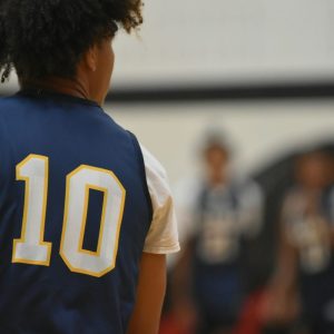 young man playing basketball