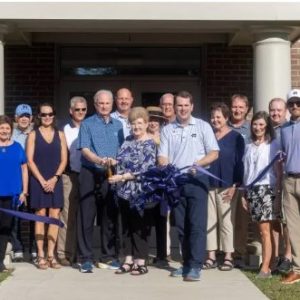 Joining John and Charlotte McMath, center, at the ribbon-cutting are Mississippi College president Blake Thompson; Kenny Bizot, MC athletic director; Ethan Doan, head coach of the MC men’s golf team; Brent Belton, head coach of the MC women’s golf team; and several lead donors.