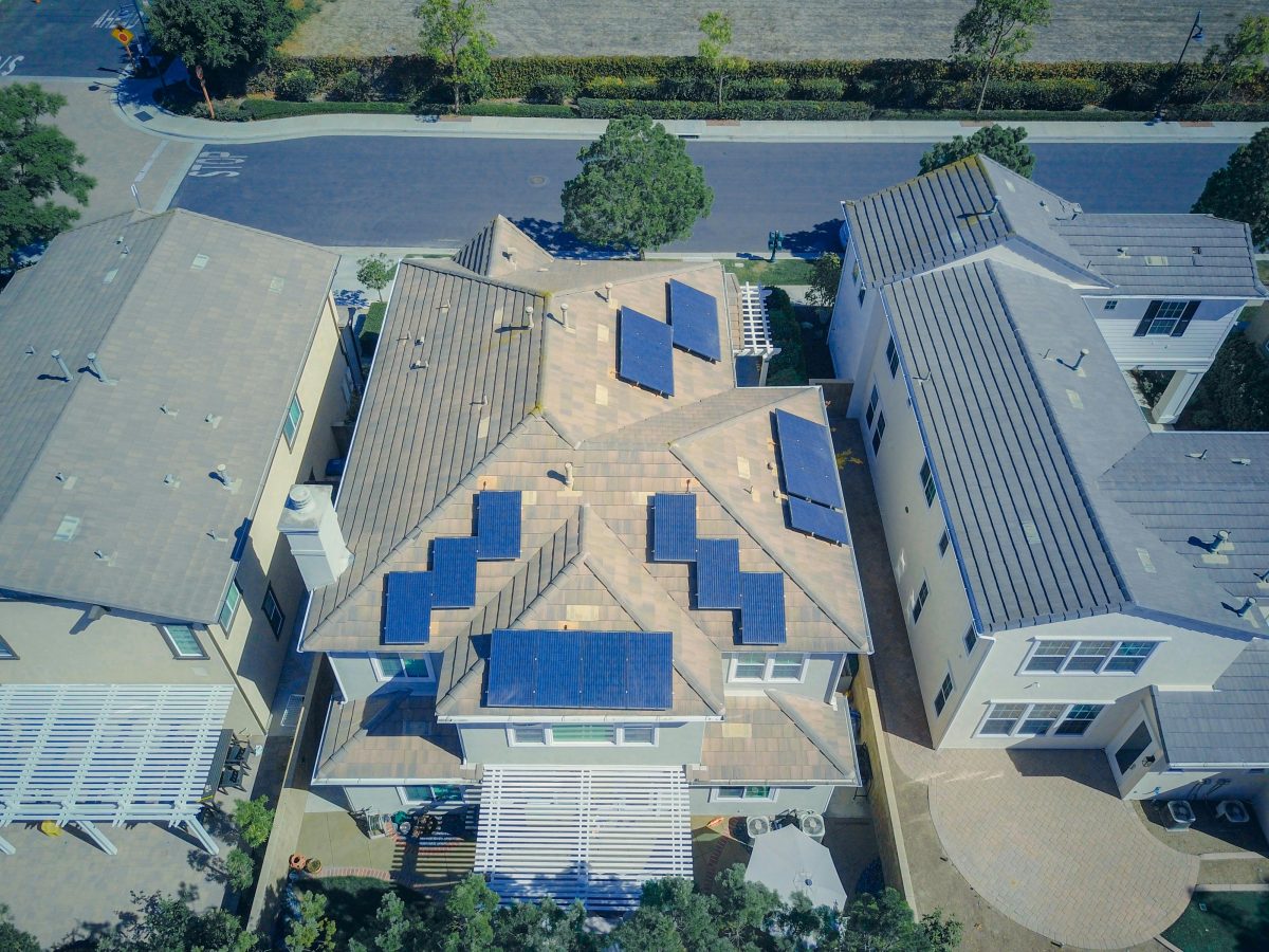 view of the roof of house with solar panels