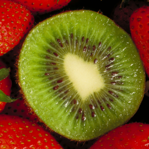 kiwi surrounded by strawberries