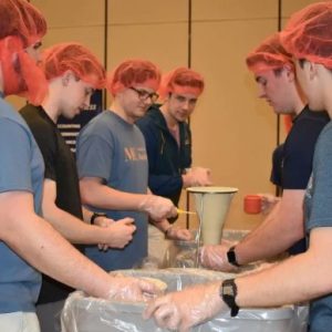 Student volunteers at Mississippi College package meals to be distributed to the world's most vulnerable through Rise Against Hunger.