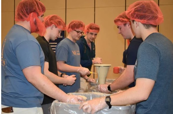 Student volunteers at Mississippi College package meals to be distributed to the world's most vulnerable through Rise Against Hunger.