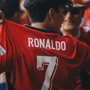 boy wearing a ronaldo number 7 jersey