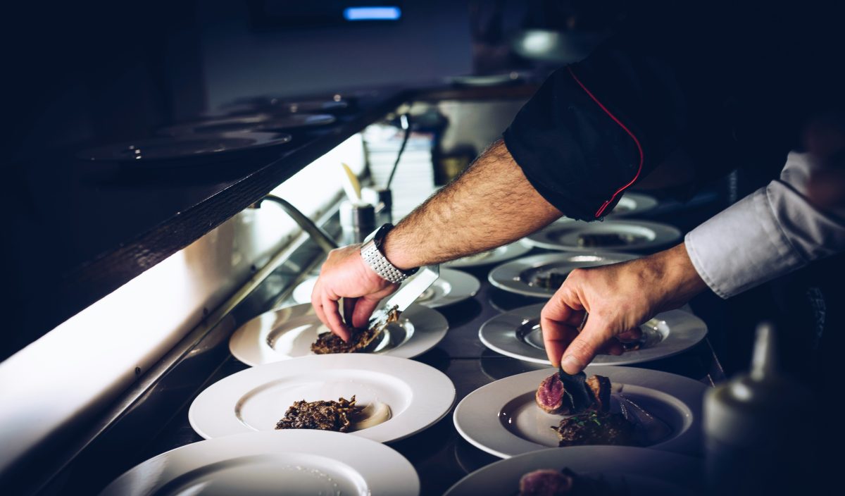gourmet chef prepares a dish
