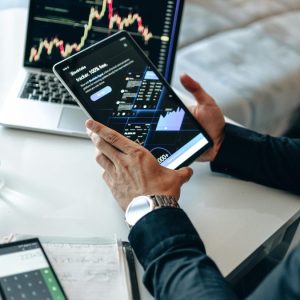 The Financial Singularity: Will AI-Driven Investing Outperform Human Portfolio Managers?