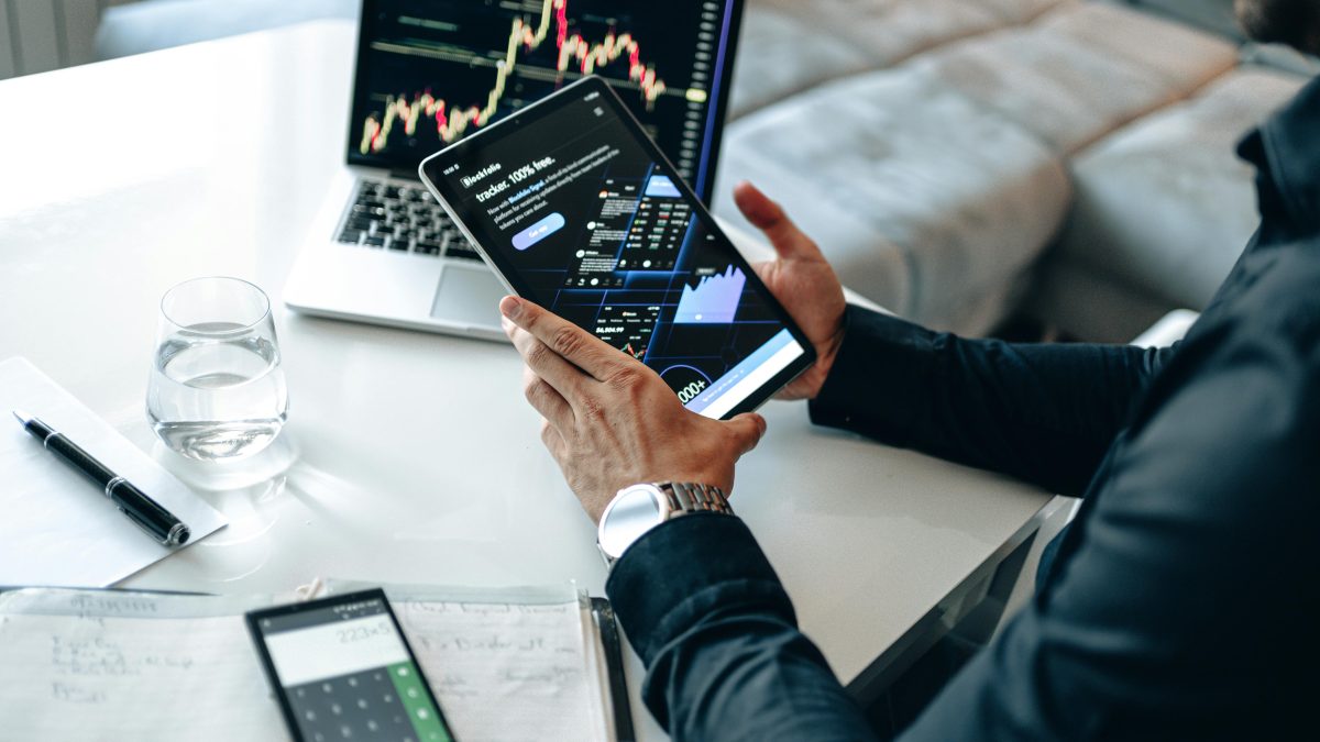 The Financial Singularity: Will AI-Driven Investing Outperform Human Portfolio Managers?