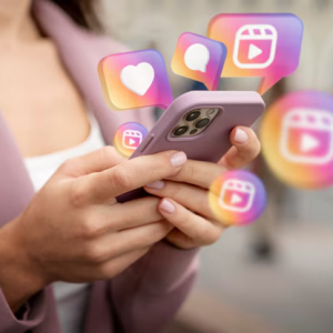 woman holding phone with instagram images