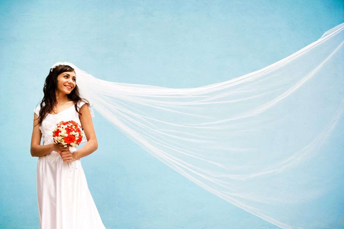bride with wedding dress and veil 