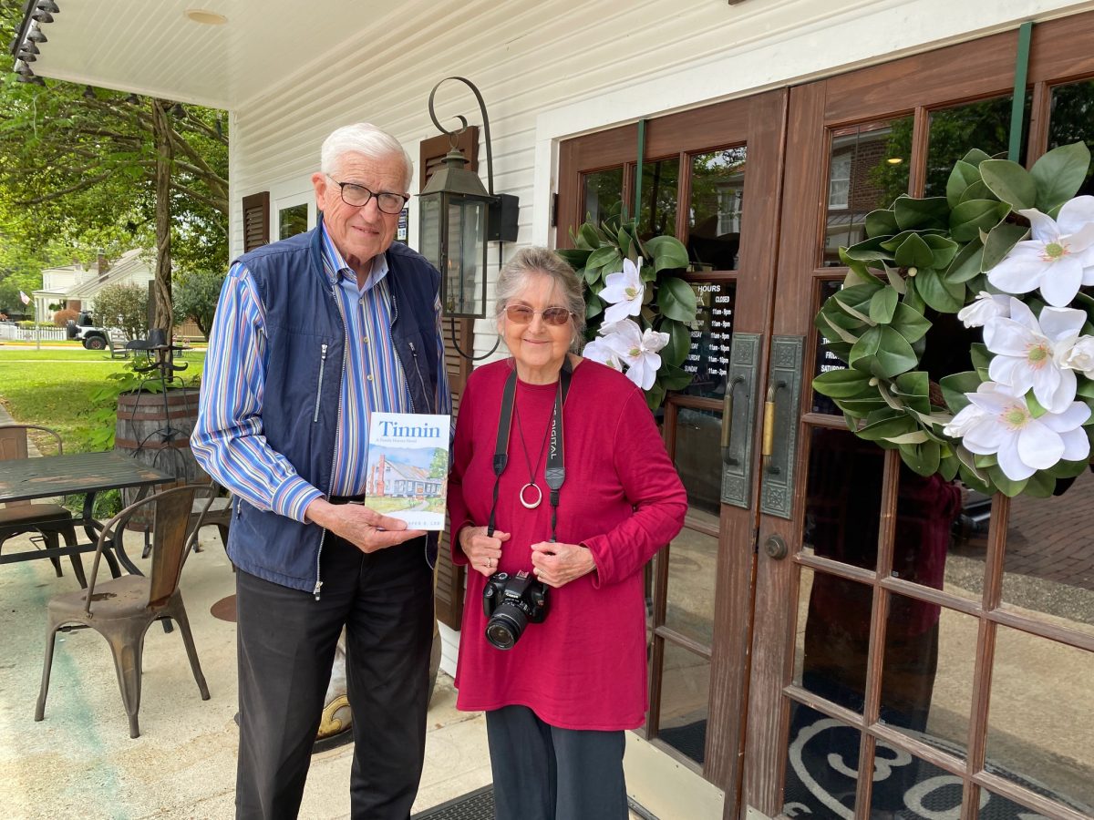 Special to The Clinton Courier Kelly, pictured after interviewing Jasper Lee, a Clinton-area native who has written multiple books about his family’s history in the area.