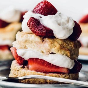 Strawberry shortcake made with homemade shortbread and whipped cream is the perfect spring dessert.