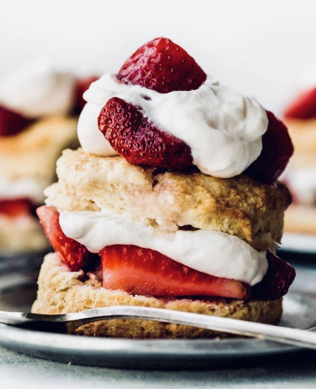 Strawberry shortcake made with homemade shortbread and whipped cream is the perfect spring dessert.