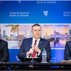 Michael J. Highfield, center, speaks during a Feb. 27 panel discussion at the Atlanta Fed’s annual Banking Outlook Conference.