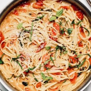 One Pan Pasta literally takes minutes to compile and cook. With a side of garlic bread and a green salad, dinner is served in less than 30 minutes.