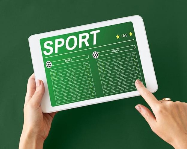 sportsbook on tablet with green background