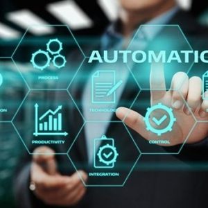 a person touching a screen with the word automation