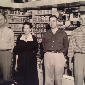 Joe and Margaret Revell, Ray Campbell and Frank Bolin. Ray and Frank were the first employees hired by Joe and Margaret Revell to work at Revell Hardware after it was founded by them in 1950.