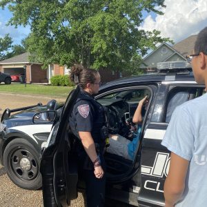 The patrol car of Officer Beth Victoriano was an attraction at a recent Oakleigh Subdivision block party. Young participants sat in the driver’s seat, crawled in the back seat, asked questions and explored all aspects of the car.