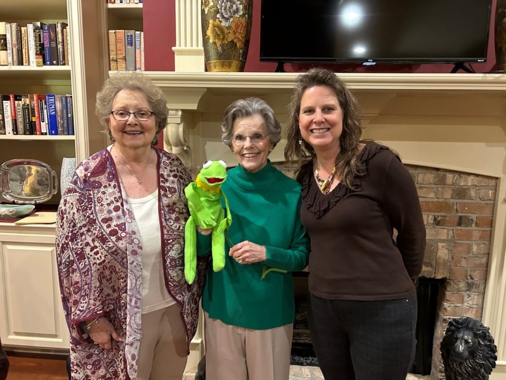 Jenta Boone, Roland Roberts and Christina Burns (l to r) welcomed special guest Kermit the Frog to the April Clinton Study Club meeting. Boone and Burns served as hostesses, and Roberts presented the life of puppeteer Jim Henson, the eighth in a series of the club's programs for the year, concentrating on Mississippi celebrities.