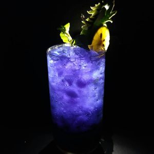 glass of blue curacao with ice