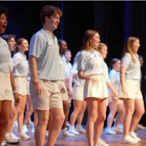 Student orientation leaders perform a routine to welcome incoming freshmen and transfers and their family members to Mississippi College during summer orientation.