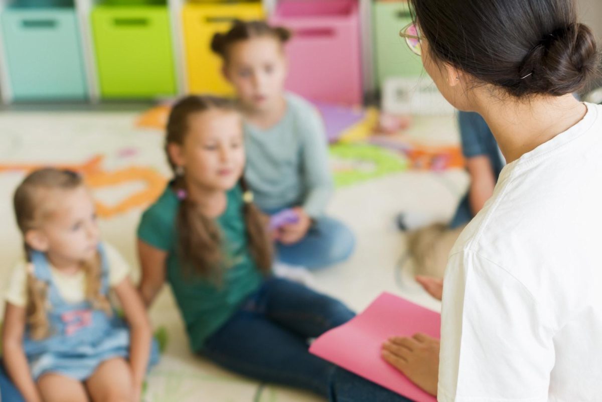 unfocused children paying attention to their teacher